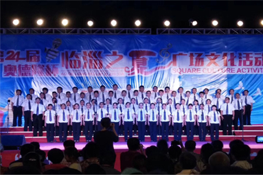 2018年7月1日，，，，，，公司合唱队参与临淄区广场文化活动。。。。。。。